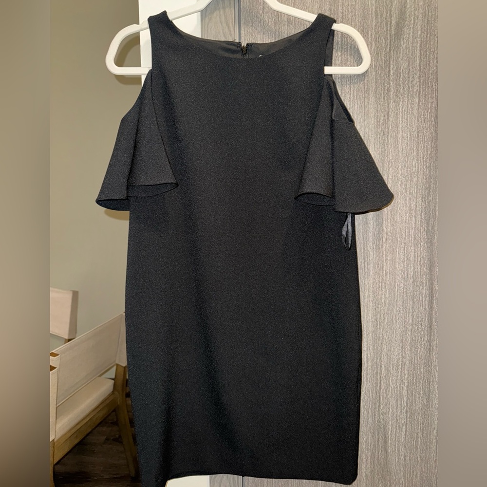 Black ruffle sleeve mini dress.